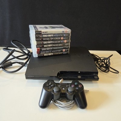 Sony PS3 Slim Konsole Bundle 8 Spiele Call of Duty Black Ops MW3 getestet funktioniert