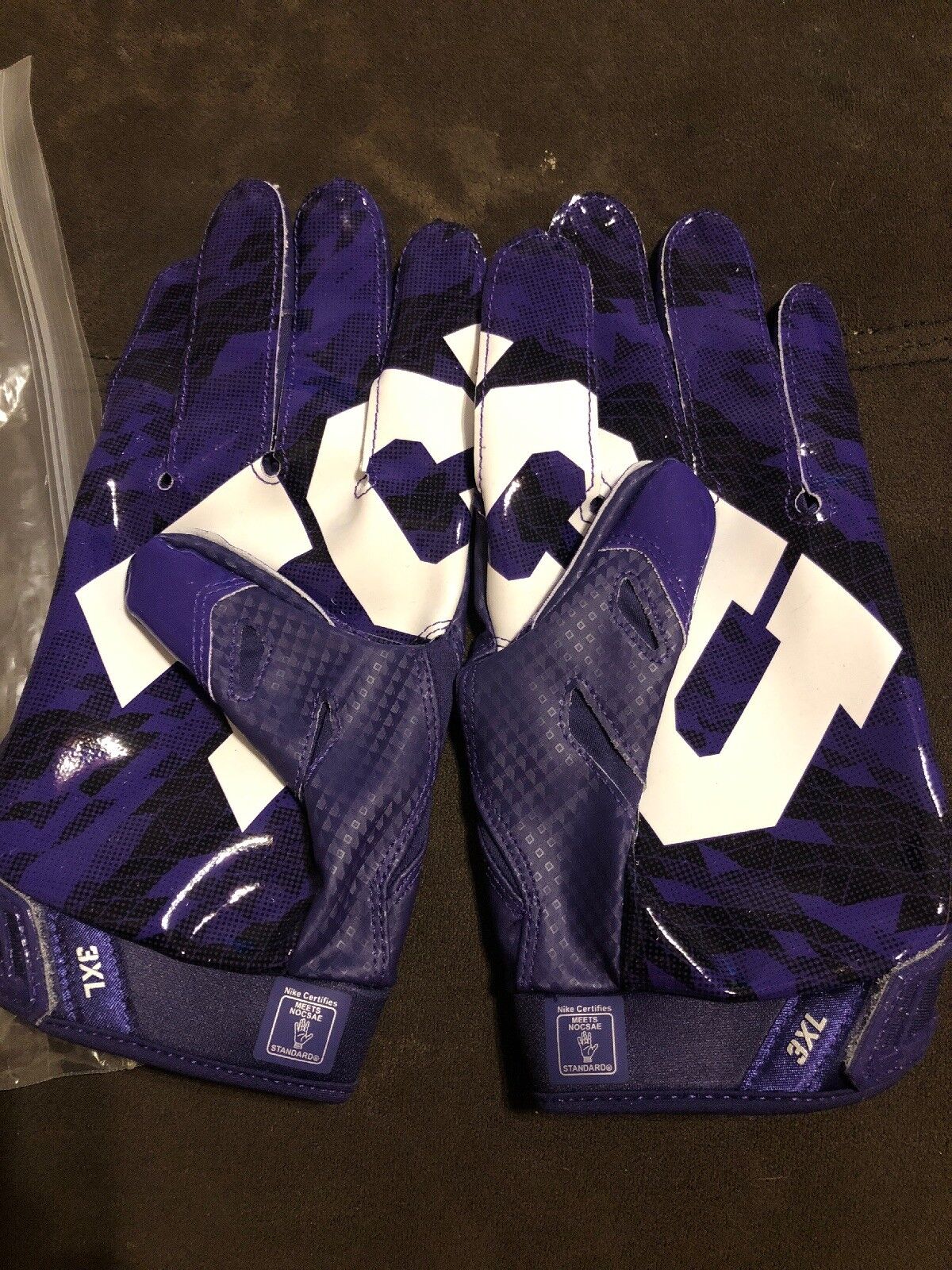 college football team issued gloves