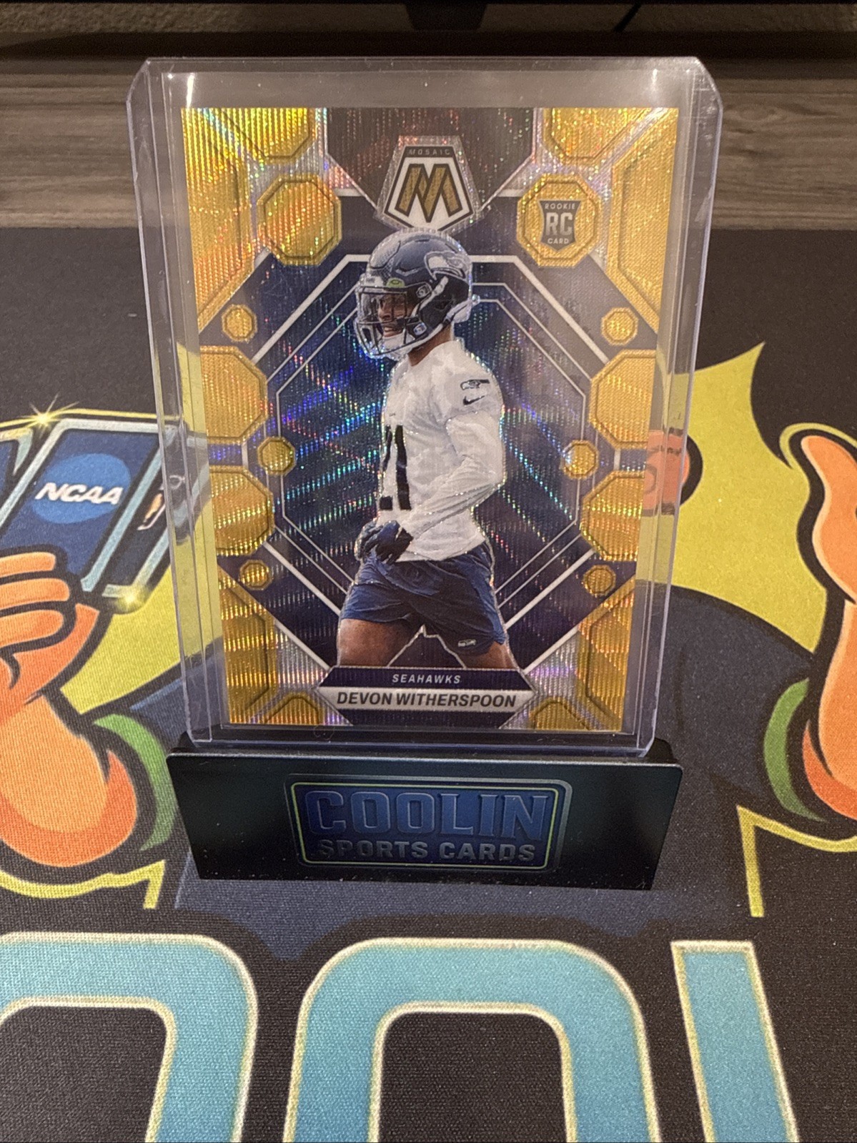 2023 Panini Mosaic - Rookies Devon Witherspoon #313 Gold Wave Mosaic /17
