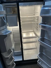 Refrigerator From Whirlpool dual side Opening Doors Has Water And Ice Dispenser