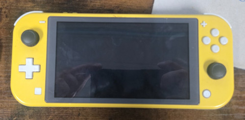Nintendo Switch Lite Yellow Handheld Console - Does not power on