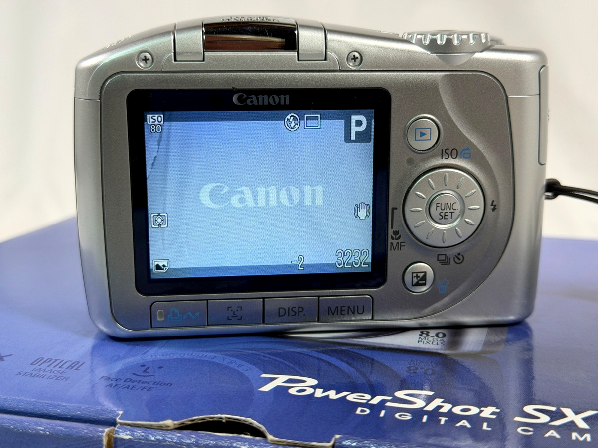 Canon PowerShot SX100 IS 8.0mp 10x Zoom Compact Camera Silver 2 mb