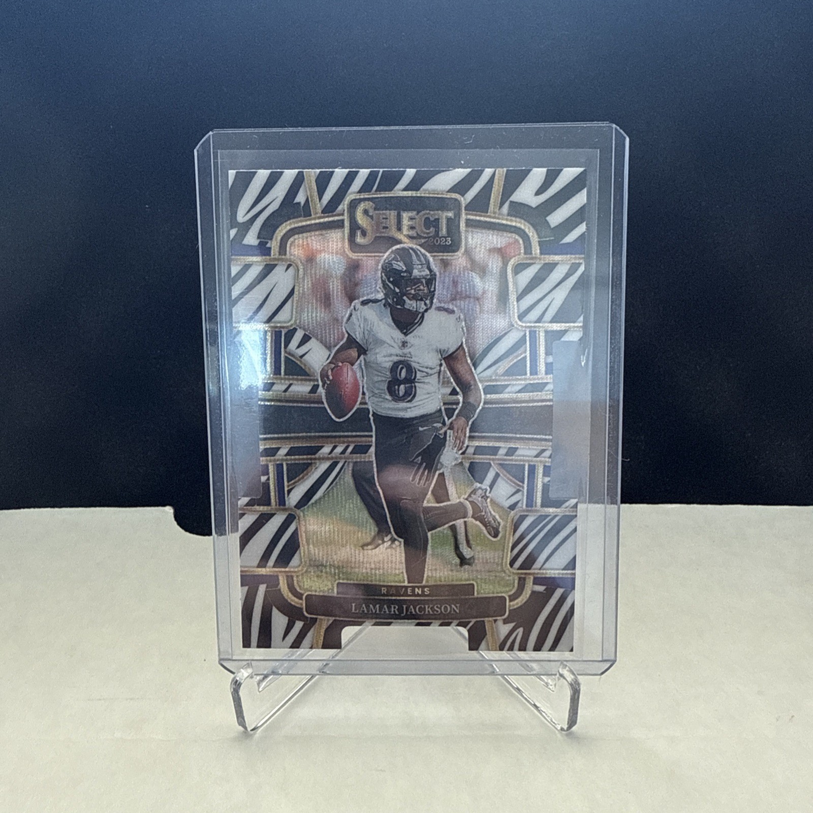 2023 Panini Select - Concourse Lamar Jackson #7 Zebra Prizm Die-Cut