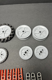 Assorted KNEX K&rsquo;nex Pieces Lot Of 84 + connectors / rods / Wheels / Tires STEM