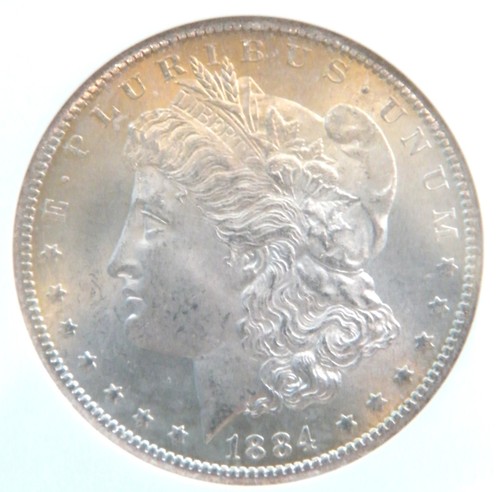 1884-CC Morgan Silver Dollar NGC graded MS 64 Light Gold Toning "FREE SHIPPING" - Picture 2 of 4
