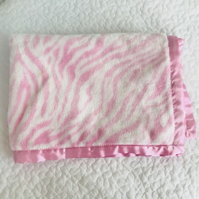 zebra blanket with pink trim