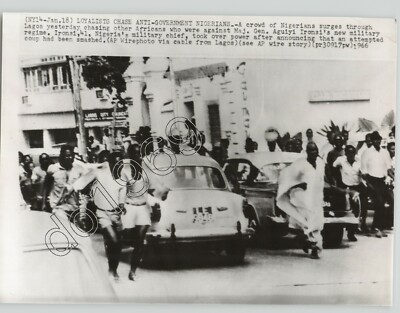 Loyalist Nigerians Chase Anti-Government Protesters after Coup Press Photo 1966