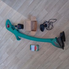 Bosch Art 23 Easytrim Grass Lawn Strimmer Cordless + charger+ battery + spare 