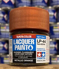 Tamiya Color lacquer color LP-44, Metallic Orange.