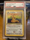 1999 POKEMON FOSSIL 1ST ED #4 DRAGONITE-HOLO PSA 7