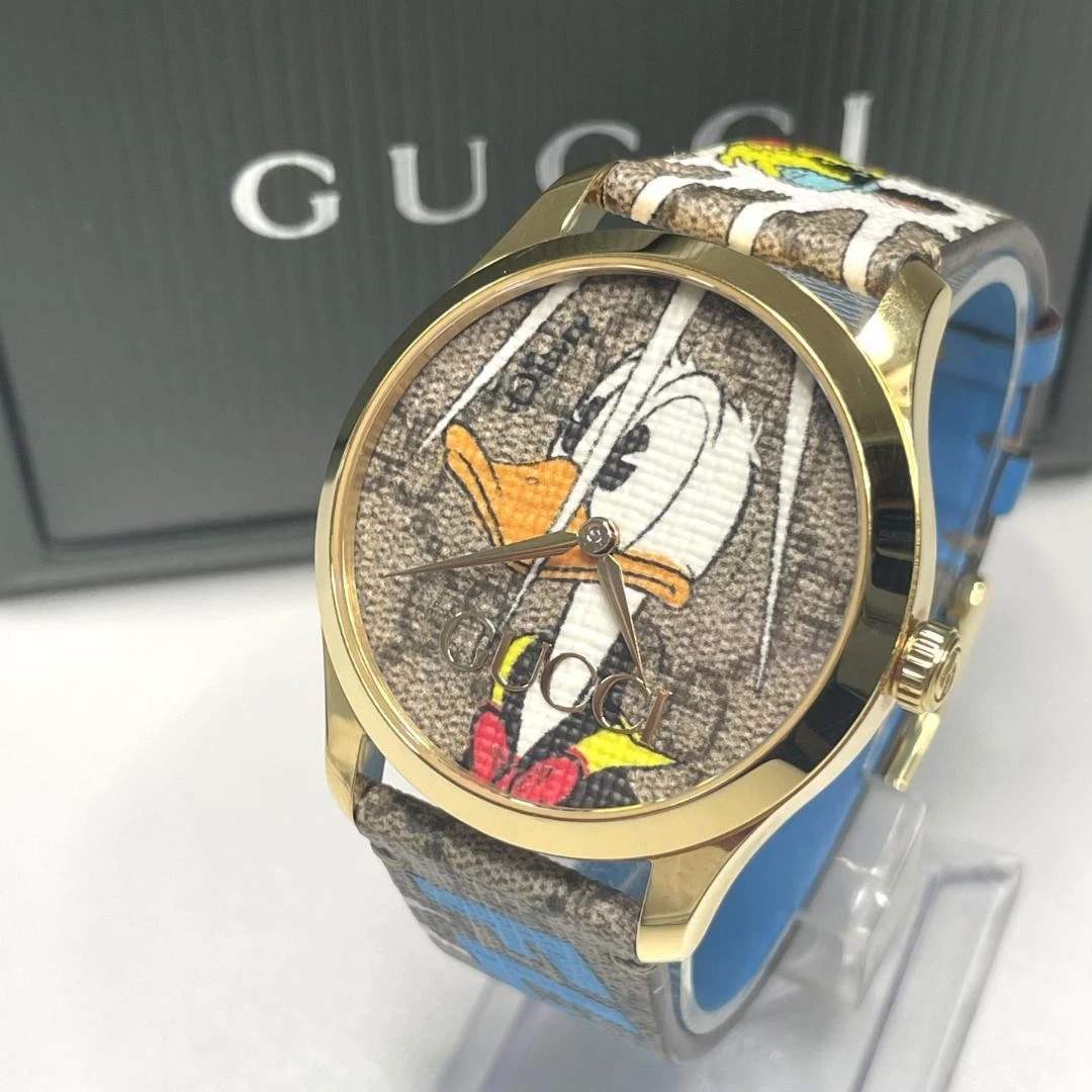 Montre Gucci Donald 126.4 Disney unisexe fonctionnement limité OCCASION rare