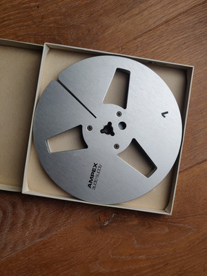 Boxed AMPEX 7'' metal reel.