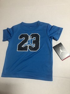 blue black and white nike shirt
