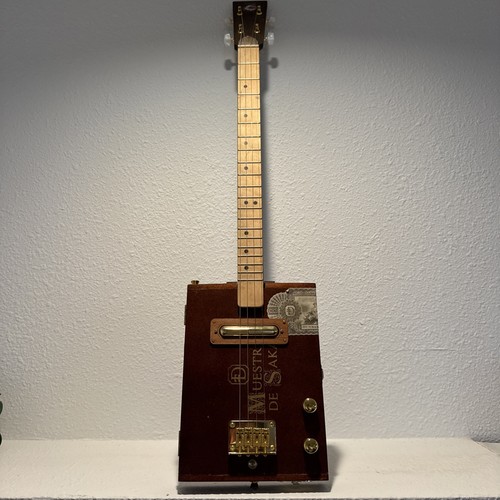 Cigar Box Electric Guitar, 4 String, Muestra De Saka “Unstolen Valor”