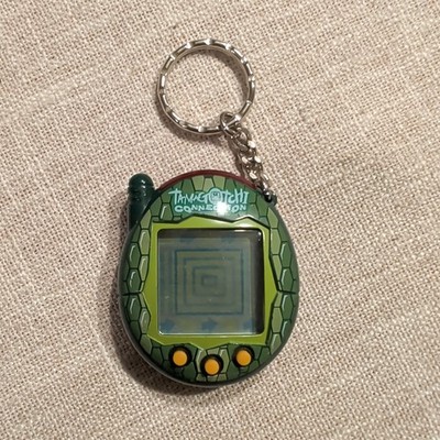 Tamagotchi Connection v3 Green Reptile Scale Skin Orange Buttons
