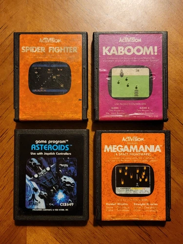 Lot of 4 Atari 2600 Games ~ Asteroids, Kaboom, Megamania, Spider Fighter WORKS