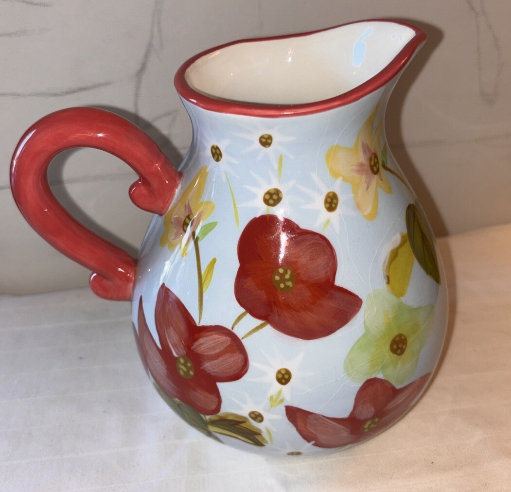 Beautiful Collectible Harry and David Blue with Red Flowers Ceramic Pitcher. 7”