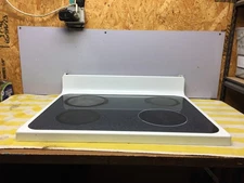 GE RANGE COOKTOP (CHIPPED PAINT) PART# WB62T10786 free shipping