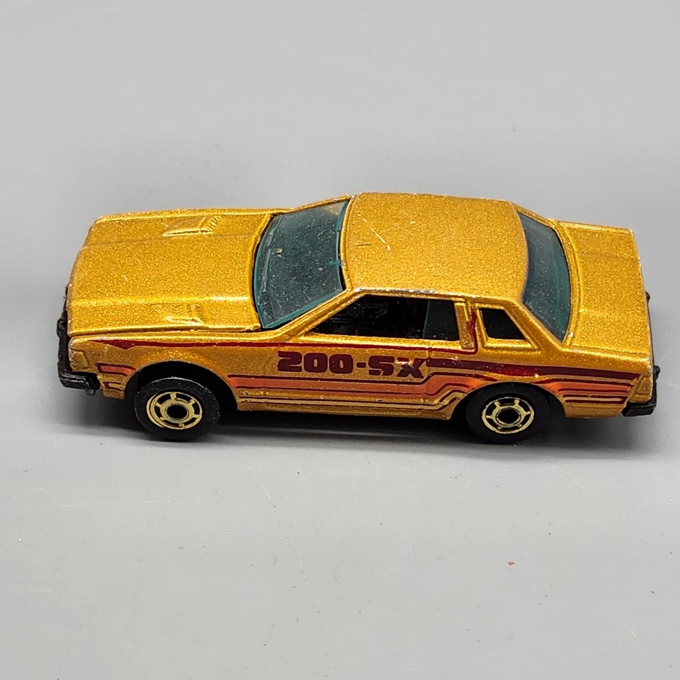 Coche diecast vintage Hot Wheels Datsun 200 SX dorado 1983 capó de apertura Japón 1:64 Foto 4 de 4