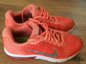 peach nike trainers