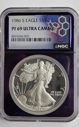 1986-S Proof American Silver Eagle NGC PF 69 Ultra Cameo Trader Bea Purple Core