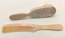 Vintage 2 Pc. IVORY PA-RA-LIN with Raised Flowers Baby Comb and Brush 5 1/2"