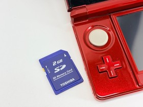 Nintendo 3DS Flame/Red Handheld System Bundle w/Mario Kart 7 Charger & SD Card