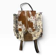 Myra Upcycled Canvas Cowhide Zip Top Flapover Design Stalk Backpack