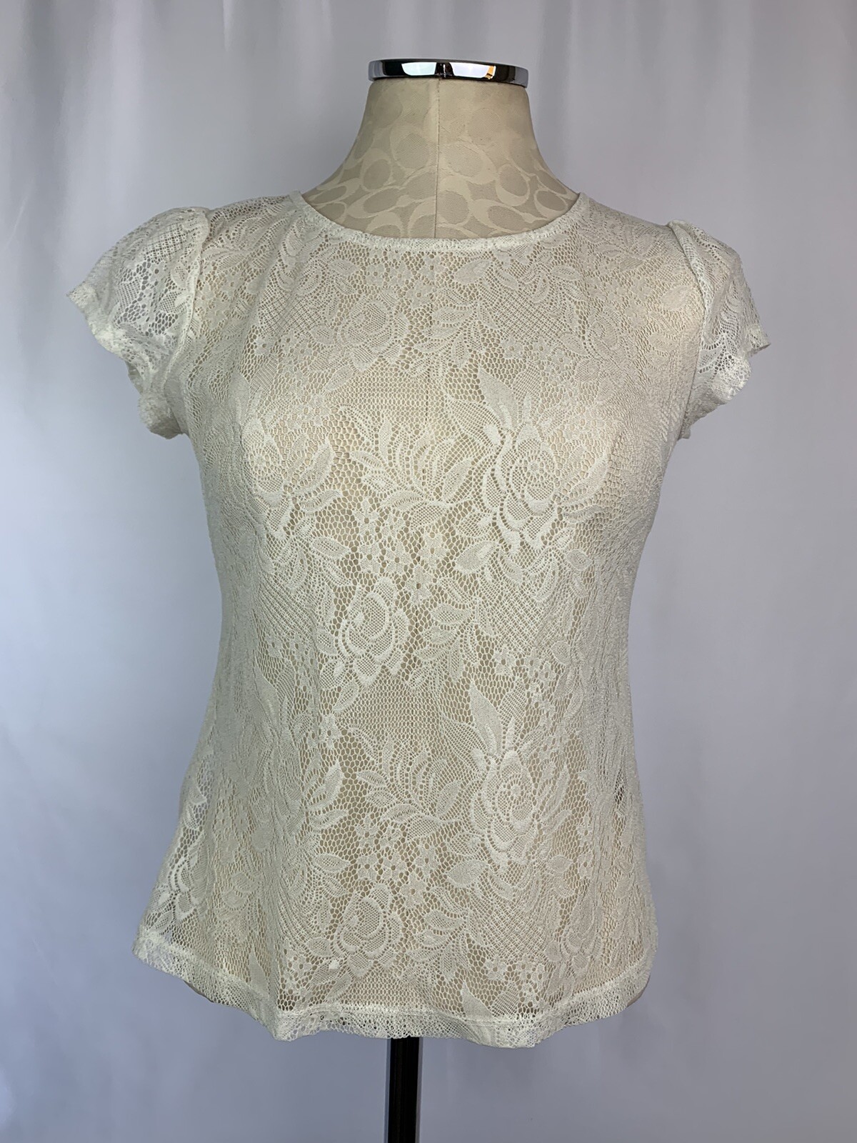 Top donna Small bar III prima fila pizzo avorio manica corta trasparente dettaglio cerniera