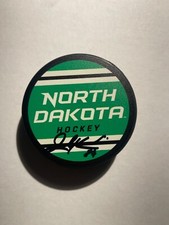 North Dakota Fighting Hawks JORDAN KAWAGUCHI Signed Hockey Puck SIOUX