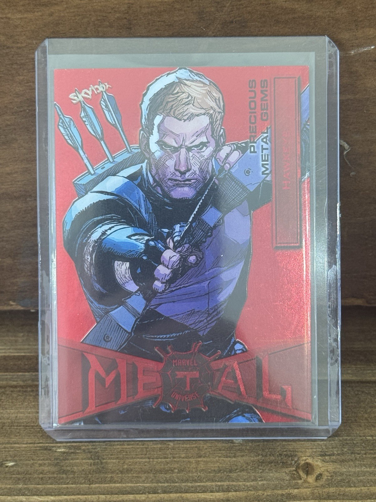 2022 Upper Deck Marvel Spider-Man Metal Universe PMG Red #31 Hawkeye /100