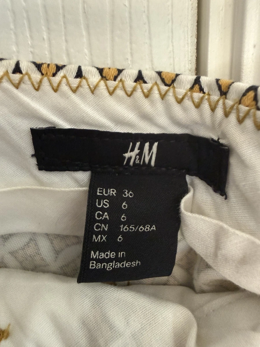 Pantalones de vestir geométricos para mujer H&M blancos negros amarillos tejidos de algodón elásticos