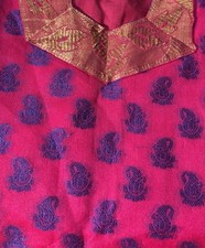 Girl Beautiful and vibrant Pink Blue Ethnic Kurti with Matching Bottom.