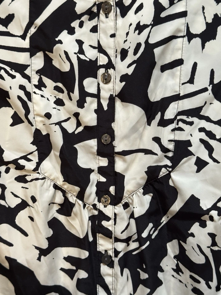 Blusa sin mangas negra blanca con estampado geométrico sin mangas boho negocios carrera casa de campo Foto 4 de 4