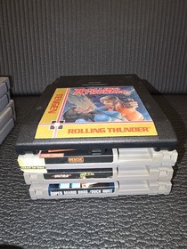 Nintendo NES with Game Genie and Games