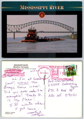 postcard - tugboat moves cargo under Hernando Desoto Bridge near Memphis