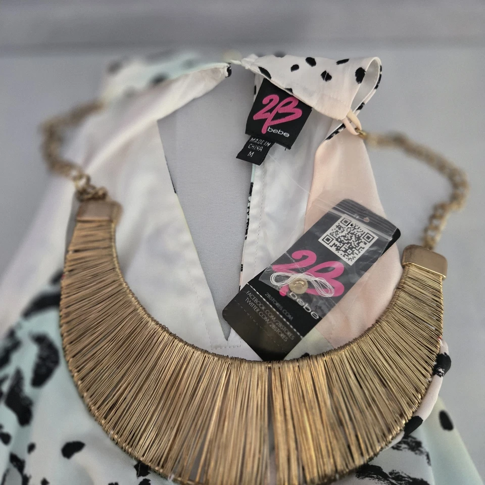 Camisa sin mangas Bebe estampado animal peplum correa de espagueti para mujer M con escote de metal Foto 3 de 4