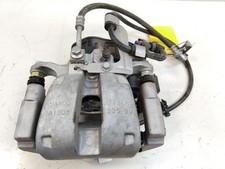 Tesla Model Y original Bremssattel Hinterachse rechts Mando 1044628-00-A Bj.2023