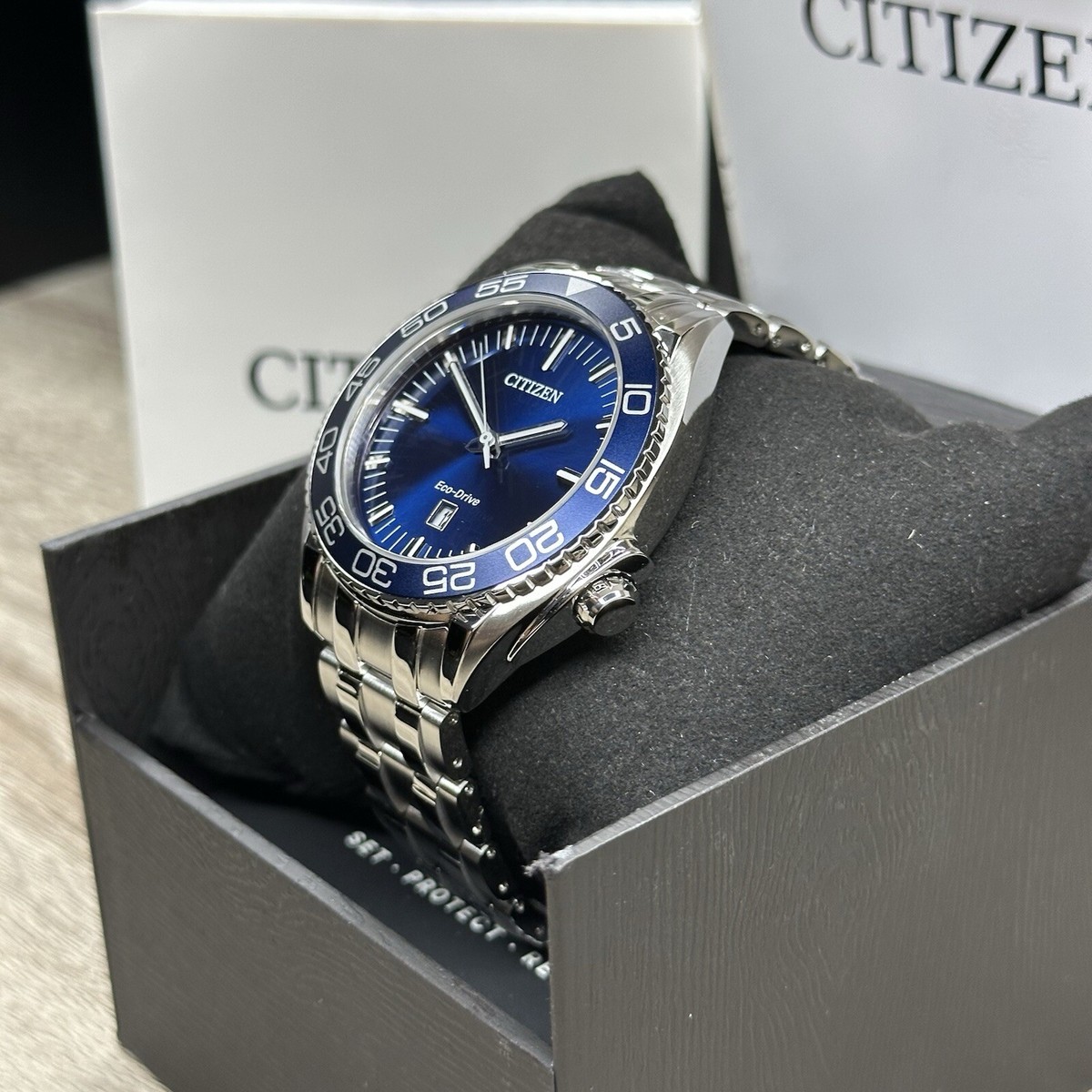 MSRP $525✓Citizen Eco-Drive Carson Silver Steel Blue Date Men's