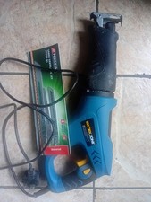 Reciprocating Saw Complete With New Spare Blades Used In Good Condition
