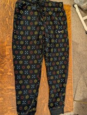 Black Nike Sweatpants With Nike Swoosh Pattern M