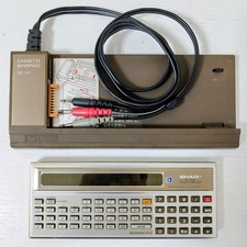 Sharp PC-1211 Pocket Computer with Cassette Interface CE-121 Used