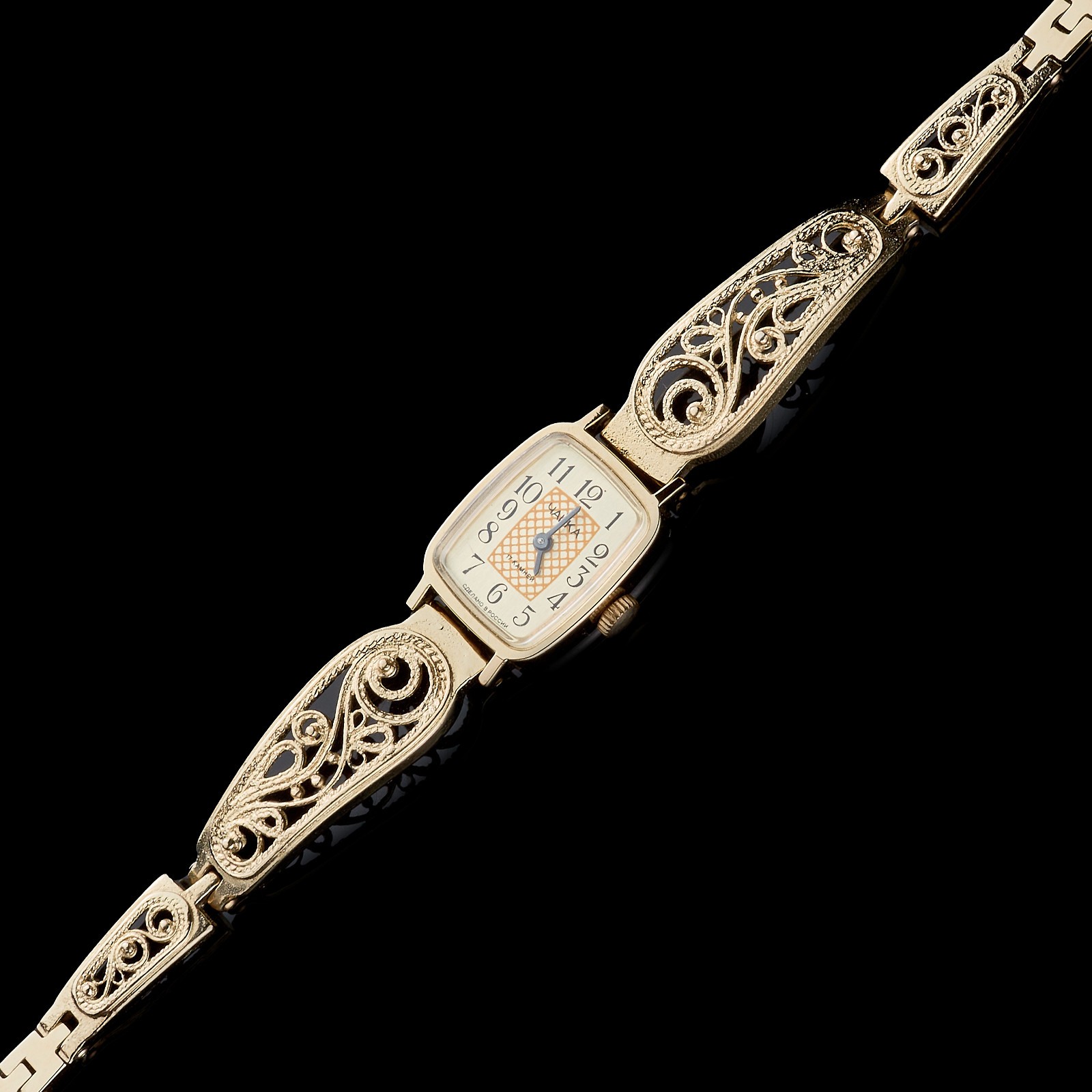 Small women's cocktail watch with gold color. Vintage women's mechanical watch.