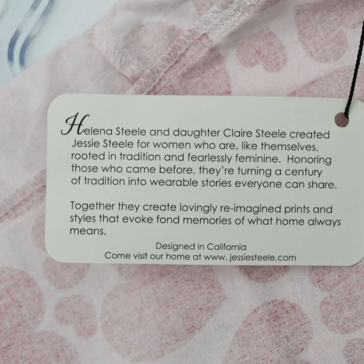 Delantal estilo halter Jessie Steele Bombshell Sweethearts rojo y rosa con bolsillo Foto 4 de 4