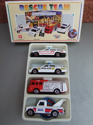 Avon Smilers Rescue Team Set - vier Fahrzeuge, Schild, Abzeichen 70er Jahre OVP