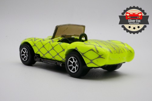 1962-67 SHELBY COBRA VERDE SCALA 1:64 PRESSOFUSO DIORAMA MODELLINO AUTO DA COLLEZIONE - Foto 2 di 10