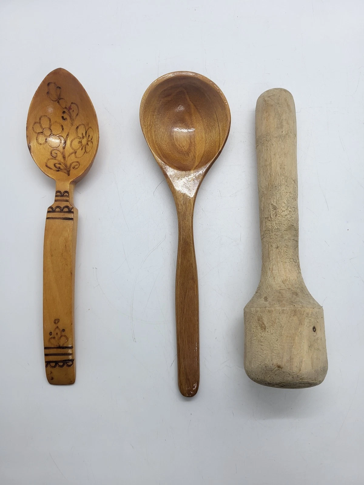 Vintage wooden kitchen tools, spoons and mortar, handmade with wood burning USSR