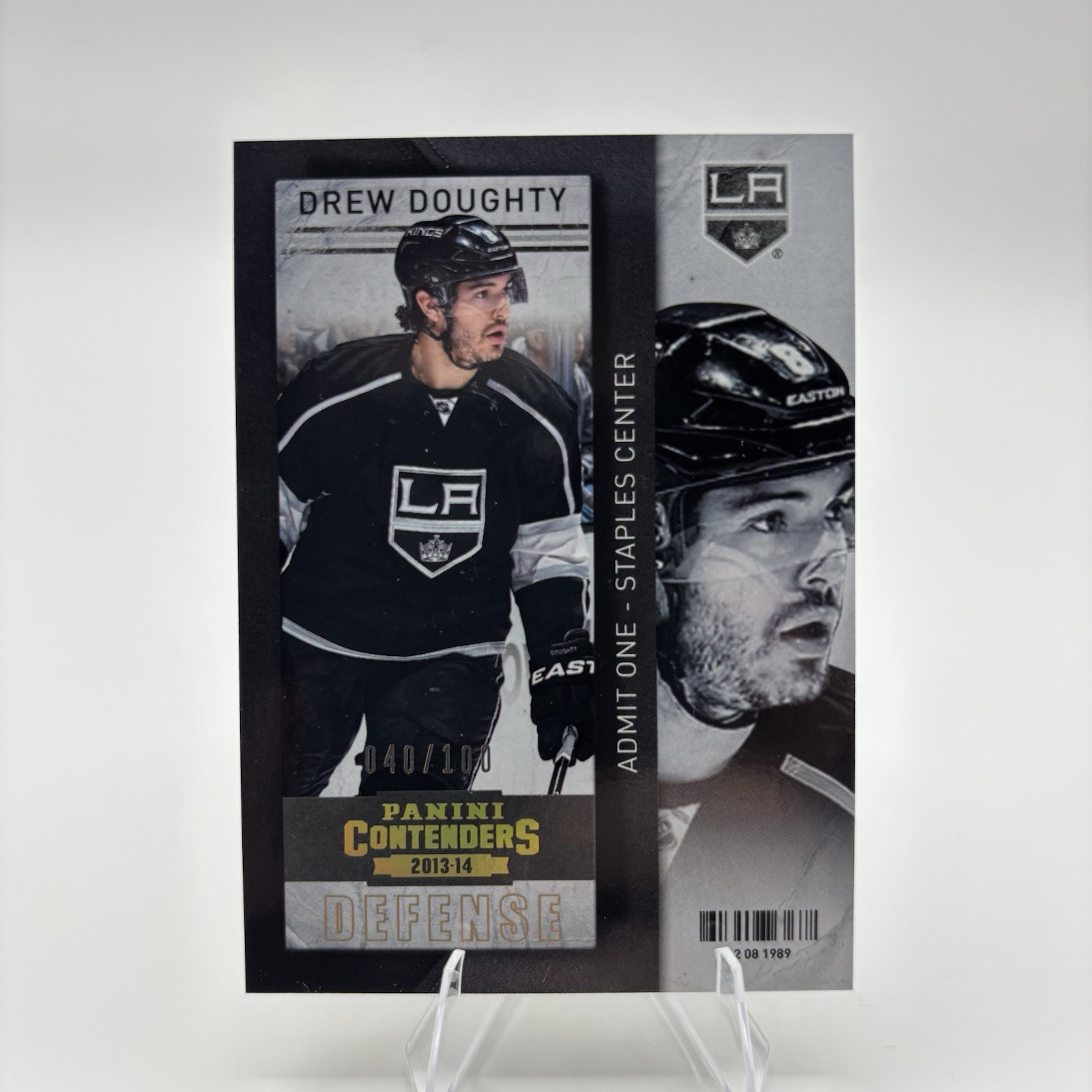 Drew Doughty #27 Hockey Cards 2013 Panini Contenders trading card — raw and PSA graded price guide