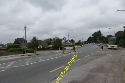 Foto 12x8 The R630 Mainister na Corann Leaving Midleton. c2015