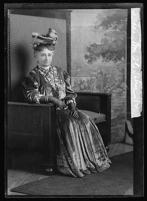 Photo:Mrs. O.C. Sahir Portrait in Hat and Gown